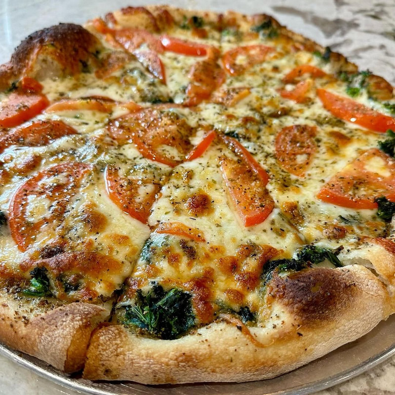 White pizza with fresh toppings